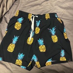 chubbies 7” Black Swim Trunks with Yellow & Teal Pineapple Print